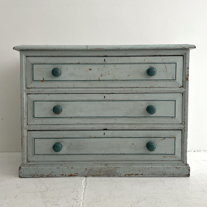 An Edwardian blue painted chest of drawers 