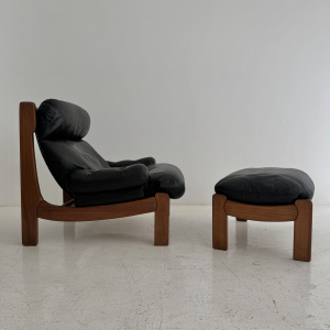 A french Maison Regain lounge chair & stool. 