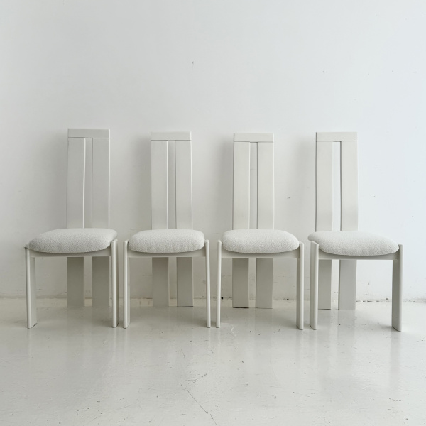 A set of 8 post modern Italian dining chairs by Pietro Costantini.  image