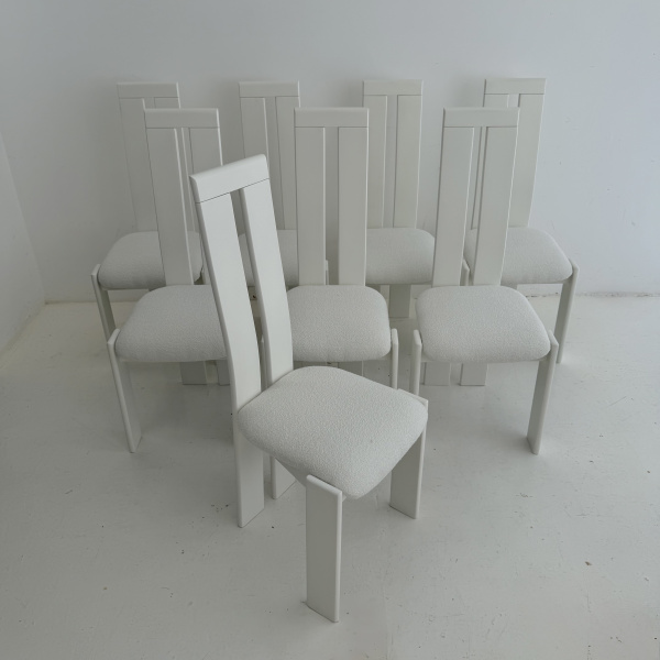 A set of 8 post modern Italian dining chairs by Pietro Costantini.  image