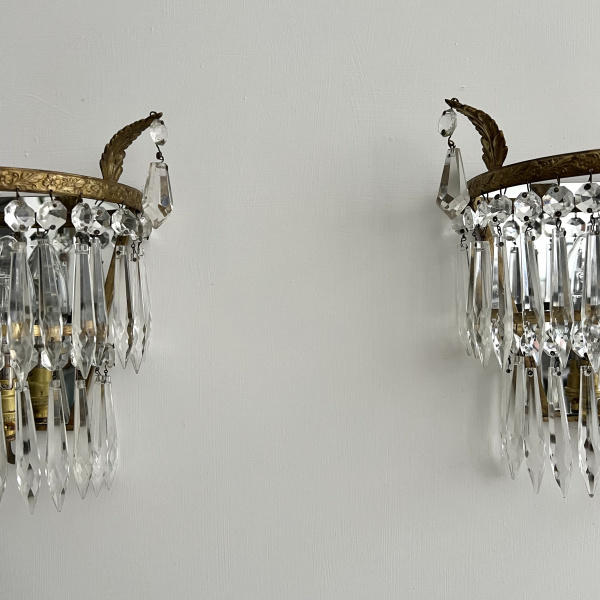 A pair of early 20th century brass and glass wall lights | Modern Antiques